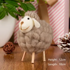 Detailed view of handmade felt sheep decoration showing 12cm height and 10cm length