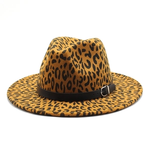 Close-up of leopard print wool fedora hat featuring a black leather band and metal buckle