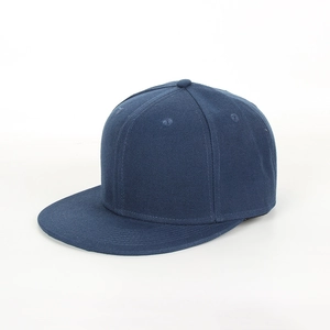 Detail view of the premium navy blue flat brim snapback hat showing twill fabric texture