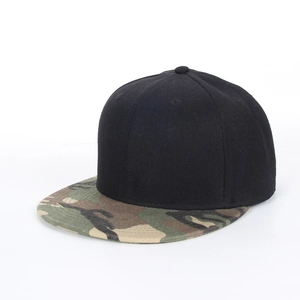 Detail of high-quality hip hop cap with black crown and camouflage flat brim design