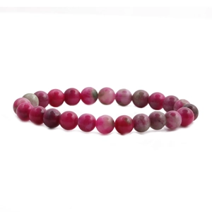 Ethnic style flower charm bracelet with pink and grey agate stone beads on white background
