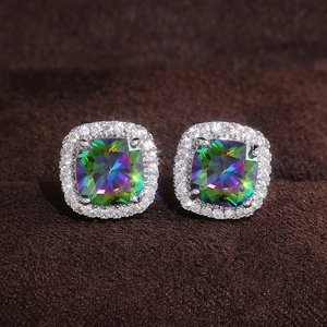 Macro shot of square rainbow mystic topaz halo stud earrings on brown velvet padding