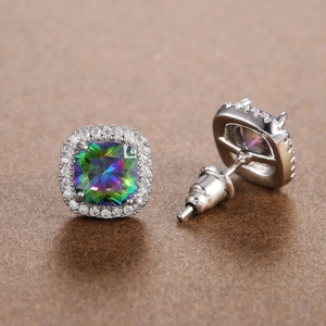 Macro shot of square halo earrings with colorful faceted stones and silver setting