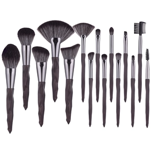 Professional 15pcs diamond handle makeup brush set with dark bristles on white background