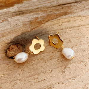 925 sterling silver gold flower stud earrings with irregular pearls on wood background