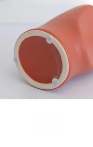 Detailed macro view of the matte ceramic vase bottom with white non-slip protective pads