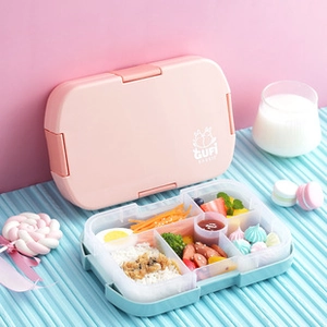 Pink and blue compartment bento box with divided inner tray for organized kid lunches