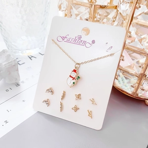 Détails du coffret collier bonhomme de neige de Noël et boucles d'oreilles or