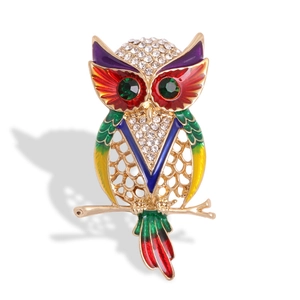 Exquisite owl brooch in golden alloy with colorful enamel and sparkling rhinestones
