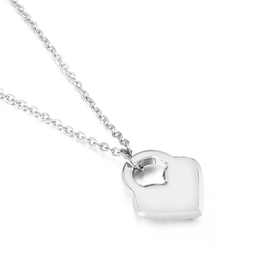 Minimalist silver heart pendant necklace with delicate chain for women on white background
