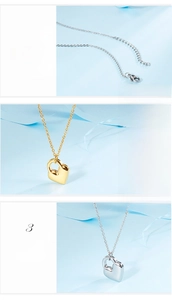 Detail showing the adjustable chain extender and lobster clasp on the heart necklace