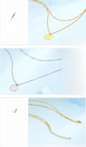 Detail view of titanium steel layered necklace showing adjustable chain and round pendant