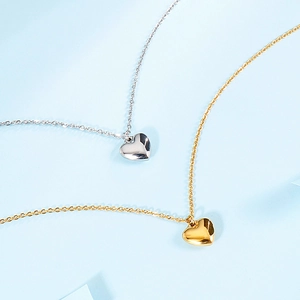 Minimalist heart pendant necklaces in gold and silver finish with cross chain