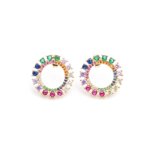 Detailed shot of gold circular earrings featuring multi-colored micro-pave cubic zirconia