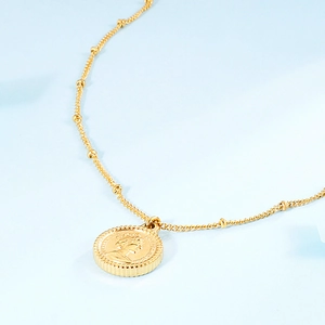 Golden stainless steel necklace featuring a round Queen Elizabeth coin pendant and satellite chain