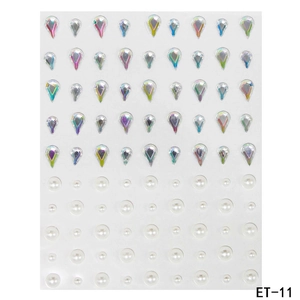 Detail view of colorful teardrop rhinestones and white pearls for DIY face makeup