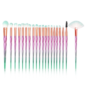 Detailed set of diamond-handle makeup brushes with vibrant gradient bristles on white background