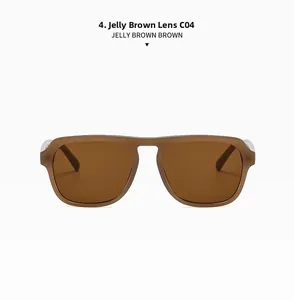 Dettaglio di occhiali da sole oversize marrone gelatina con lenti colorate C04 e montatura