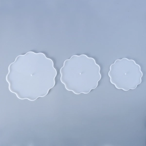 Detailed view of three tiered flower-shaped silicone molds for DIY resin fruit trays