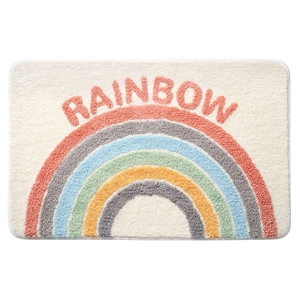 Plush white rectangular bathroom mat with colorful rainbow pattern and Rainbow text