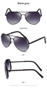 Three-angle view of vintage pilot sunglasses with black grey gradient lenses and spring legs