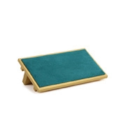 Close-up of bamboo wood jewelry stand with turquoise non-slip surface for item display