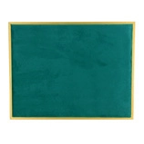 Detail of dark green velvet jewelry display board with elegant golden metal frame border