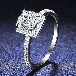 Macro detail of a 1 carat square halo Moissanite ring in S925 sterling silver with pavé band