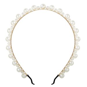 Elegant gold metal headband featuring alternating white faux pearls on a clean white background