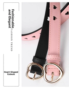 Detail of heart-shaped gold buckles and heart pattern cutouts on PU leather belts