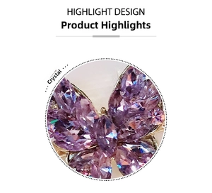 Detail of purple marquise-cut crystal butterfly hair clip with high-shine polished finish