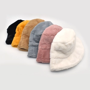 Plush faux fur bucket hats for women in six colors including black, orange and grey