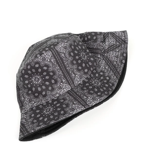 Detailed top view of black paisley print bucket hat with cotton canvas stitch detail
