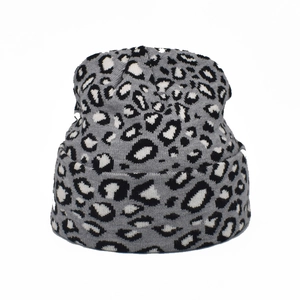 Stylish leopard print knitted beanie for winter in grey and black leopard pattern style