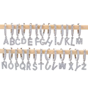 Silver letter hoop earrings set with zircon stones featuring A to Z alphabet shapes