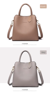 Detail showing khaki and grey textured leather handbags with detachable straps and charms