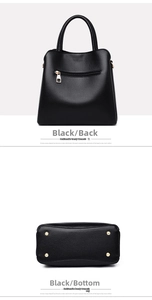 Detail of black pebbled leather handbag with back zipper pocket and gold metal feet