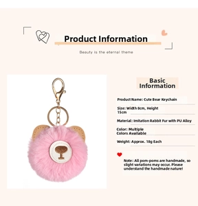 Detail view of pink faux fur bear keychain with dimensions 8cm wide and 15cm high