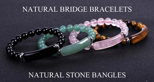 Macro shot of natural stone bridge bracelets with obsidian, aventurine, quartz and tiger eye