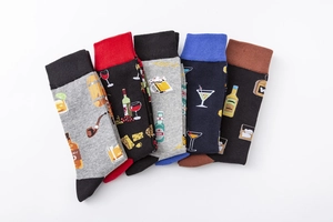 Detailed flat lay of five cotton crew socks with colorful cocktail and beer glass patterns