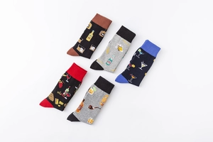 Flat lay of five cotton socks featuring colorful beer and cocktail beverage patterns
