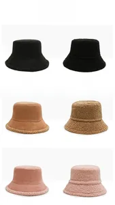 Detail of reversible fisherman hat showing cotton fabric and soft faux lamb wool textures