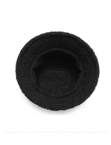 Close-up of the internal stitching and plush lining of this black winter bucket hat