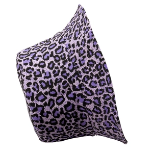 Detail showing high-quality canvas fabric and purple leopard print bucket hat texture