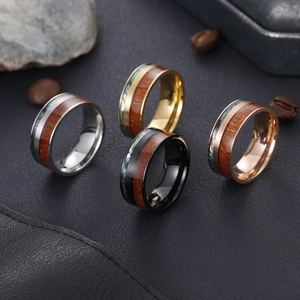 Titanium steel rings with koa wood and abalone shell inlays in four metallic finishes