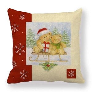 Flat lay of linen Christmas pillowcase featuring festive reindeer and forest illustration