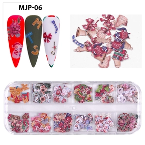 Detailed Christmas nail art charms kit with 12 grids of wood pulp flakes and holiday patterns