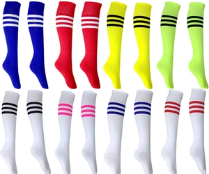 Detail view of colorful knee-high athletic soccer socks with triple stripe cuff design