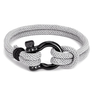 Detail of grey braided cord bracelet with black stainless steel horseshoe clasp