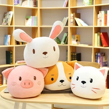 Plush animal head pillows featuring rabbit, pig, dog and cat designs on a wooden table